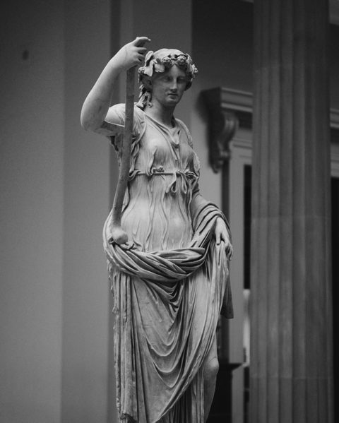 A classical statue in black and white